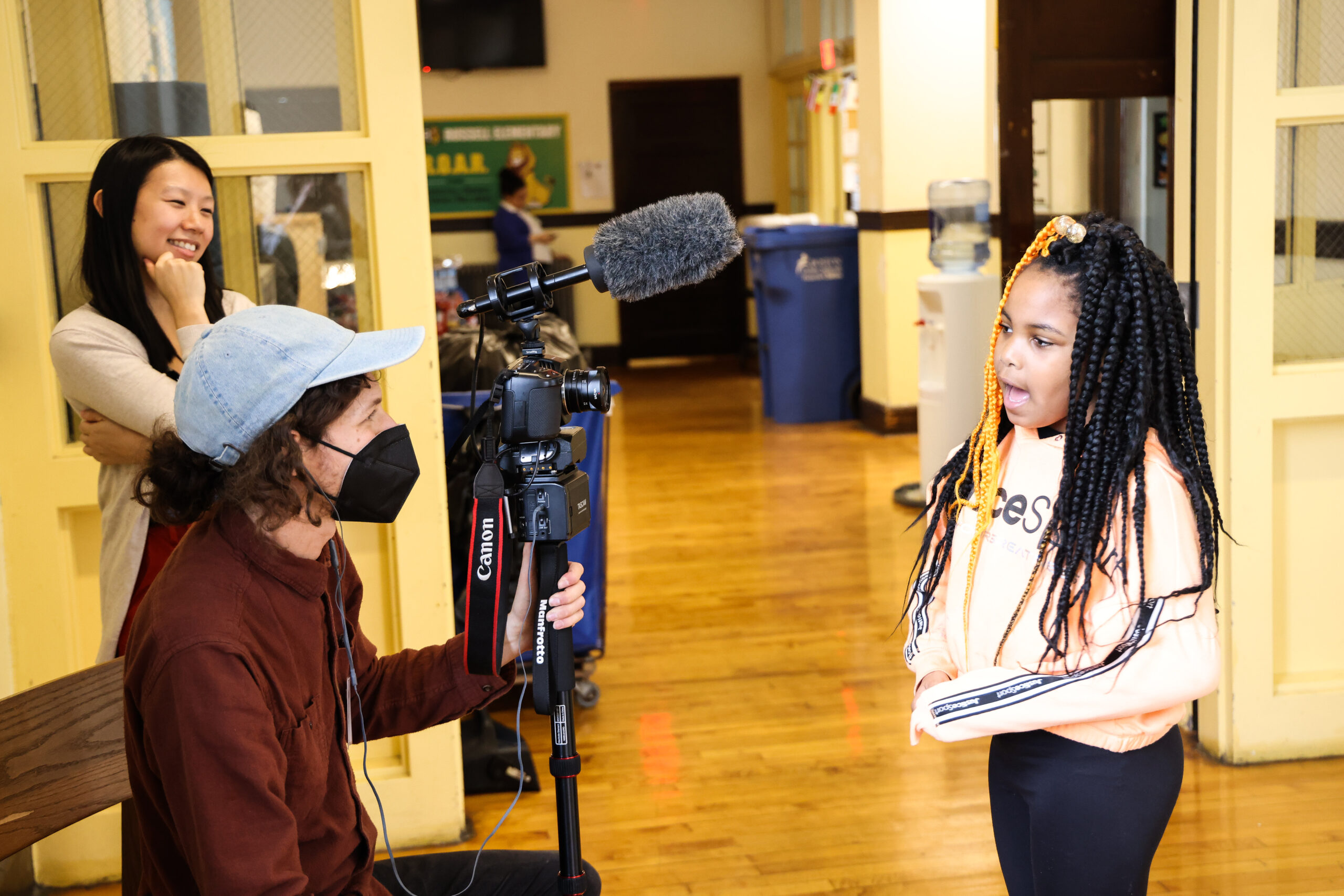 We care deeply about allowing our students to forge their own musical paths. This photo includes a student being interviewed before a CMCB event. 